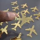 Gold airplane acrylic charm for passport wedding invitation